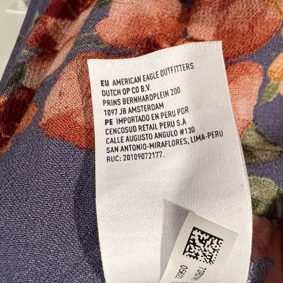 American Eagle Purple Floral Cropped Ruffle Wide
Leg Flowy Jumpsuit - Picture 5 of 7